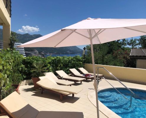 Wonderful view from the balcony of the pool and the sea